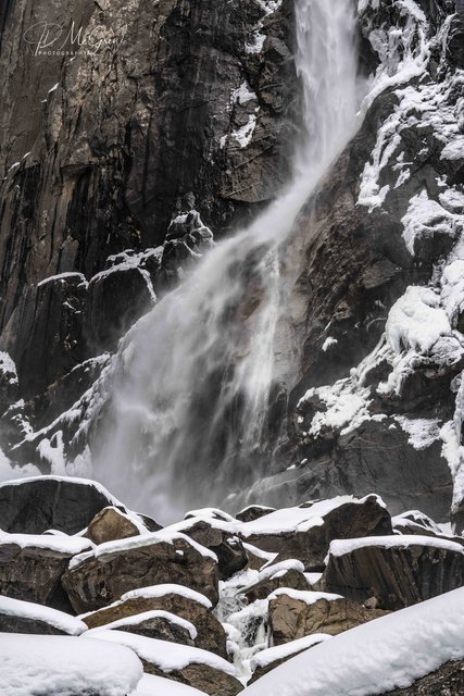 Yosemite Waterfall Crashing Onto Snow Covered Boulders #1, vertical