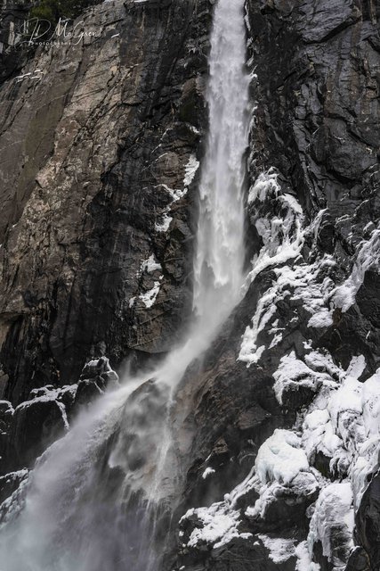 Yosemite Waterfall Crashing Onto Snow Covered Boulders #2, vertical