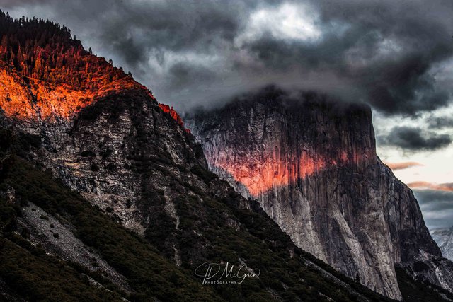 Setting Sun Flares Across El Capitan, Yosemite National Park