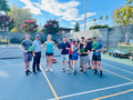 Among those pictured are Kyle Sant, Ryan Sloane, Stacey Woods, Brett Carlson, Linda Samaha, referee, Joanne Fraser, Darrell Monda, Brett Caviness