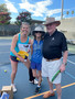 Stacey Woods and Darrell Monda with a drawing winner Linda Samaha