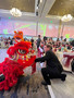 Jim Hamilton greets the Chinese dragon.
