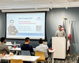 Lunch & Leanr sponsor Kyle Chuang, with Farmers Insurance, addresses the class.