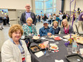Left to right: SILVAR members at the REALTOR&reg; block party - Leannah Hunt, Phyllis Carmichael, CEO Paul Cardus (standing), Alan Barbic, Joanne Fraser and Karen Trolan, all past SILVAR presidents
