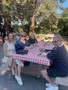 Enjoying the pleasant afternoon with good food and company.