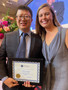 SILVAR 2025 President-elect Stacey Woods congratulates 2024-2025 CAREA President Mark Zhang on behalf of SILVAR.
