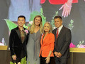 Wood with CAREA's executive board Jason Wang, vice president; Anna Truong Lopez, secretary; and Wilson Chai, treasurer.