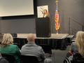 President Eileen Giorgi greets members.