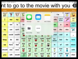 TouchChat HD with WordPower AAC app screen with pop-up window for sending messages via text or email.