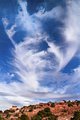 Cirrus cloud-funnel after snow storm, Arches National Park, Utah, United States